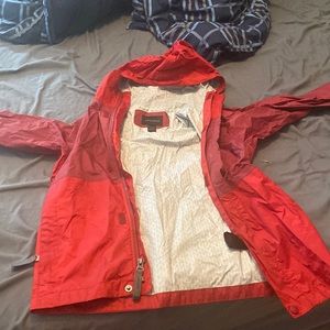 Boys Marmot rain jacket. Red. Size small.